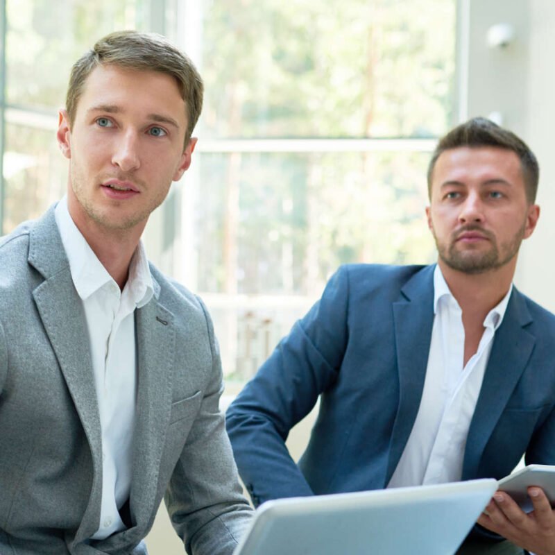 Businessmen receiving a letter of demand.